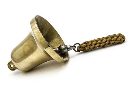 Brass bell, isolated on white backgroundの写真素材