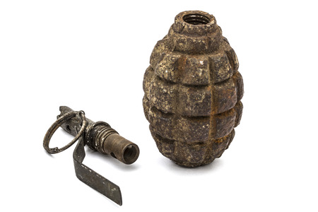 Old grenade and fuse, isolated on white background