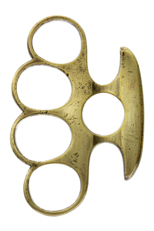 Brass knuckle-duster, weapon for hand, isolated on white backgroundの写真素材