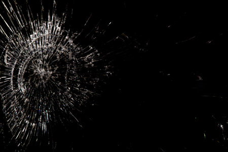 Broken glass, white lines on black background, design elementの写真素材