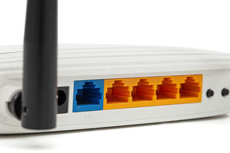 RJ45 connectors of wireless router, isolated on white background