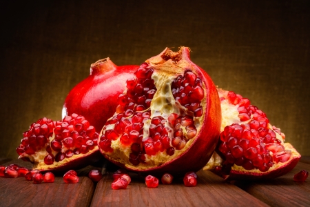 red pomegranate fruits on a dark backgroundの写真素材