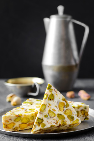 eastern traditional dessert with nuts on gray background. Selective focusの写真素材