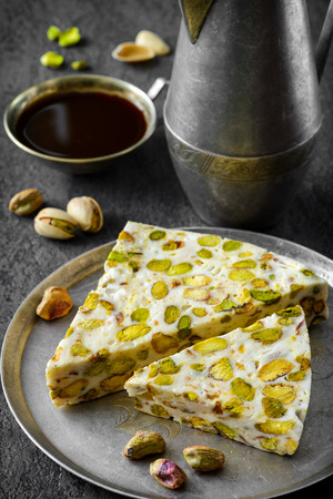 eastern traditional dessert with nuts on gray background. Selective focusの写真素材