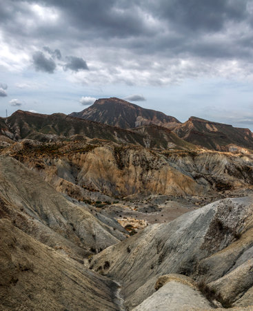 Beautiful landscape of canyon and mountains on the background dramatic sky, Tabernas, Almeria, Spain