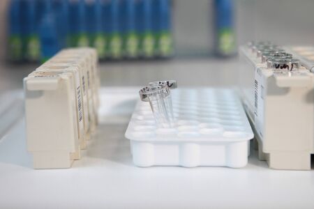 Close-up empty test tube stands in a stand in a laboratory. Medical research concept.Top view. Copy...
