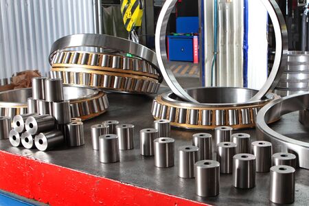 Manufacture of bearings in the factory.The chrome surface of products. Industrial theme. Production...