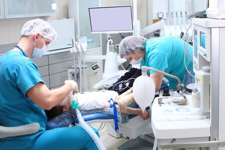The doctors the doctors prepare for surgery of a little boy. Concept of health care and life saving. Copy space.の写真素材