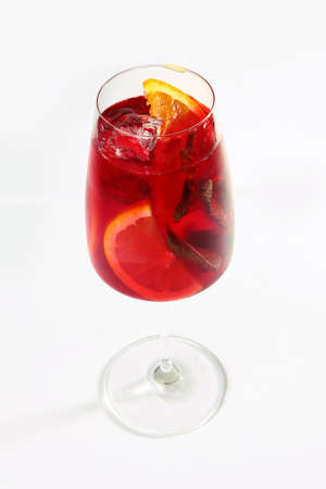 Orange and strawberry lemonade with mint leaves. Non-alcoholic drink. Summer season. Isolated...