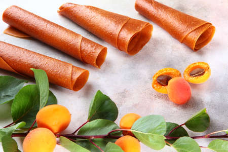 Apricots and fruit pastille on a white background. Natural and dietary product. Without...