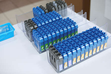 Empty test tube stands. Photo in the clinical and diagnostic laboratory. Scientific research in the...