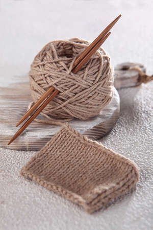 Multicolored cotton yarn for hand knitting.Tangle stand.Vertical photo.Top view.Copy space.