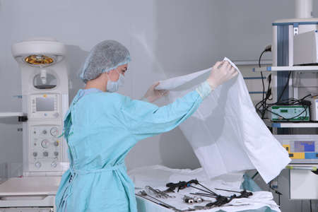 Preparation of medical instruments for surgery. Work of a nurse in the operating unit. Instruments for laparoscopic surgery. Real operating room.の写真素材