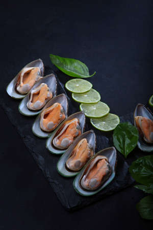 Child is under general anesthesia. surgery under anesthesia. Operating room .Oxygen mask on the child's face.Measurement of oxygen levels in the blood. A child's hand.Face is out of focus.の写真素材