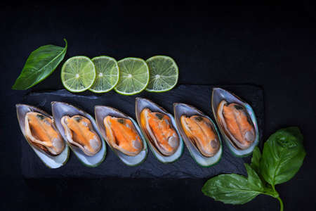 Child is under general anesthesia. surgery under anesthesia. Operating room .Oxygen mask on the child's face.Measurement of oxygen levels in the blood. A child's hand.Face is out of focus.の写真素材