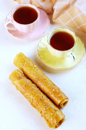 Homemade apple pastille. Healthy food without sugar. The pastille is rolled into a tube.Vertical photo.の写真素材