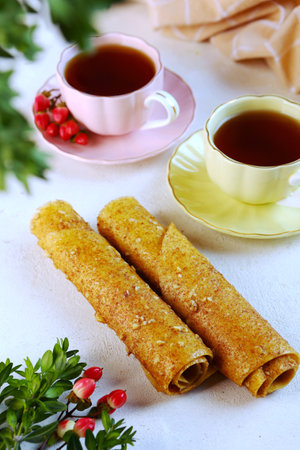 Homemade apple pastille. Apple pastille. Healthy food without sugar.The pastille is rolled into a tube. Vertical photo.の写真素材