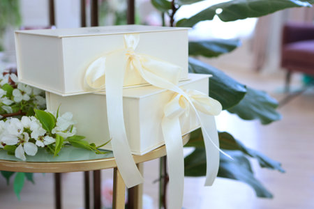 Boxes with gifts on the table. Boxes tied with bows. The concept of holidays.Copy space.の写真素材