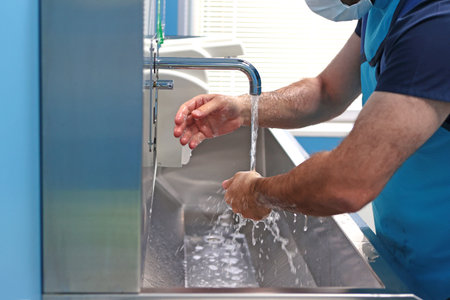 Doctor washes his hands before operation. Doctors hands. Concept of healthcare.の写真素材