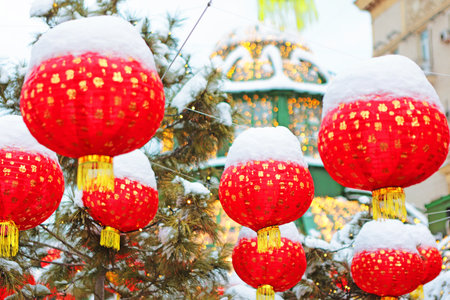 Chinese lanterns in snow. Red Chinese lanterns. Chinese New Year. New Years holiday. Without people.の写真素材