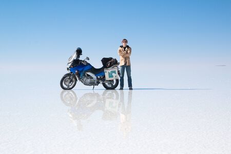 Travel by motorcycle in Salar de Uyuni Boliviaの写真素材