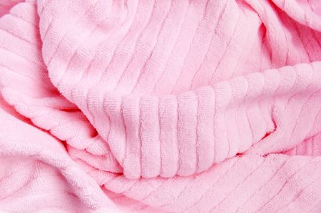 The pink towel lying loose foldsの写真素材