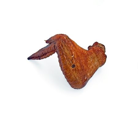 Smoked chicken wing on a white backgroundの写真素材