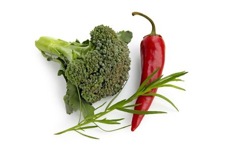 Broccoli, red hot pepper, a sprig of tarragon isolated on a white backgroundの写真素材