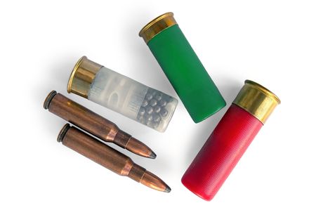 White translucent, green, red arms cartridges, two cartridges for the carbine isolated on a white...