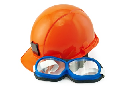 Goggles black and blue with a white strap, orange helmet isolated on white backgroundの写真素材