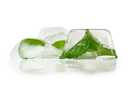 Ice with mint leaves isolated on white backgroundの写真素材