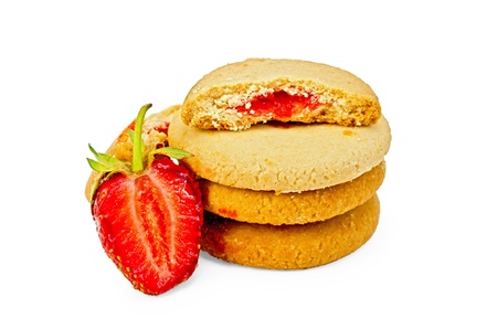 A stack of cookies filled with strawberry jam and berries isolated on a white backgroundの写真素材