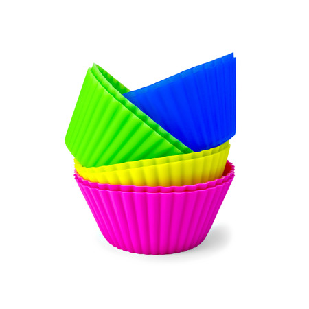 Colorful silicone molds for cupcakes isolated on white backgroundの写真素材