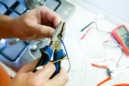 Stripping the ends of wires and connecting themの写真素材