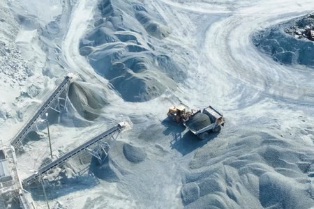 Loading and transportation of stone chips on dump trucks in quarry