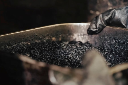 Preparation of asphalt from crushed stone and bitumen resin.の写真素材