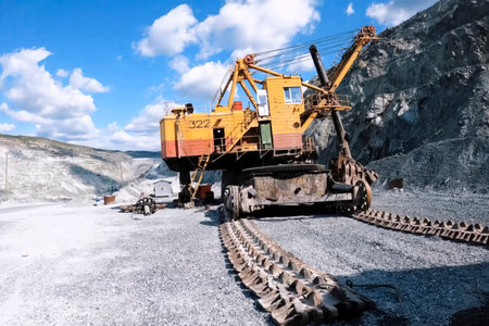 Large mining excavators in the quarry.