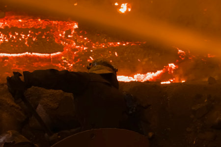 Work of a furnace in the workshop of a steel plant.
