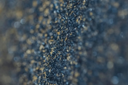 washing of rock sand containing gold particles.