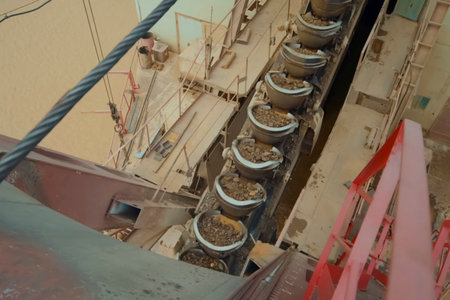 buckets of a multi-bucket excavator for gold ore mining.