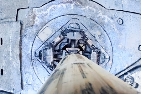 View from the tubing pipes on the drilling table from above, drilling derrick.の写真素材