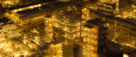 A nightscape of a liquefied gas plant located in the tundra in winter.
