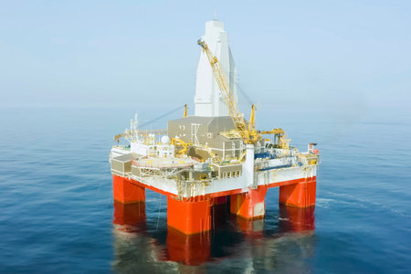 An offshore oil and gas drilling platform in the middle of the Arctic Ocean