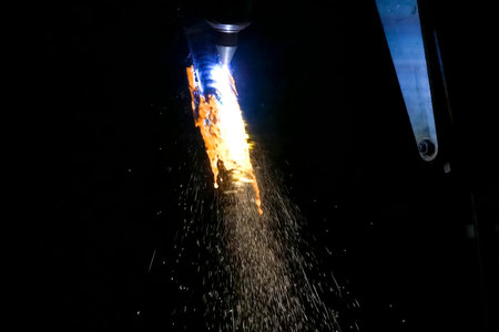 Metal splashes from laser welding.