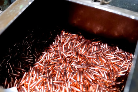 Box with newly manufactured bullets, firearms production process.の写真素材