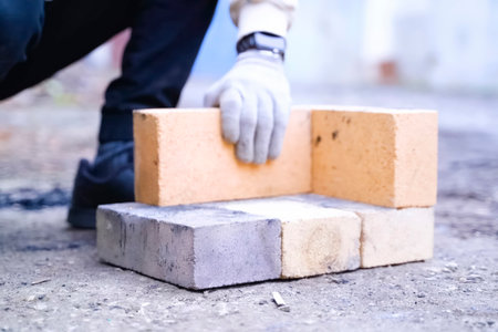 Building a fire pit structure from fireproof bricks.の写真素材