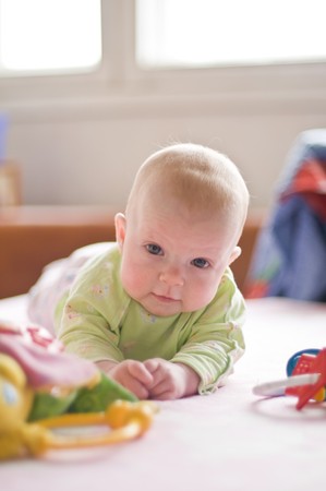 The baby with a toyの写真素材