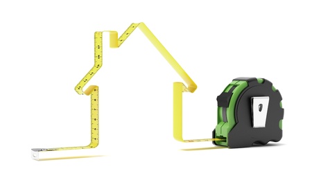 Tape measure in the shape of a house isolated on a white backgroundの写真素材