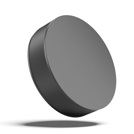 Hockey puck isolated on a white backgroundの写真素材