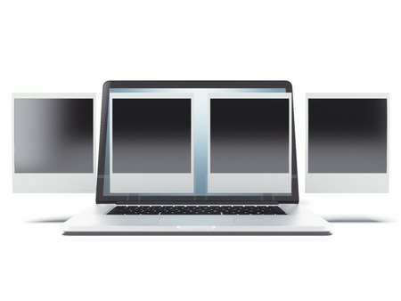 Blank instant photo frames over laptop isolated on a white background. 3d renderの写真素材